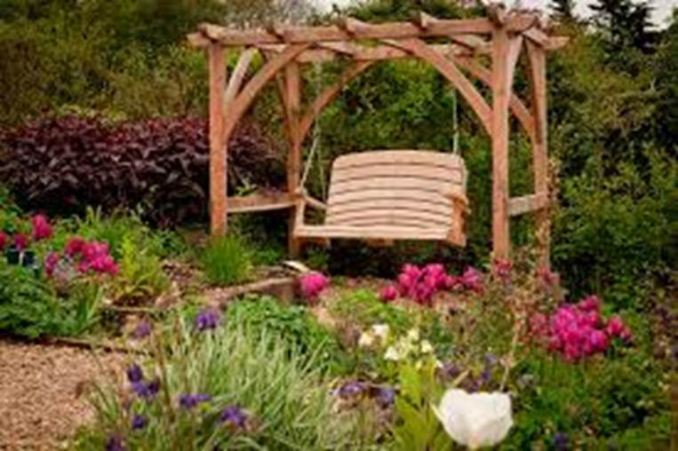 Garden Swings: The Enchanting Element in Your Backyard | Decoist